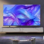 A large flat-screen 4K smart TV in a living room.