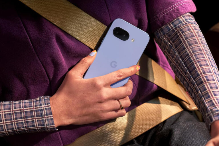 A person holding a Google Pixel smartphone.